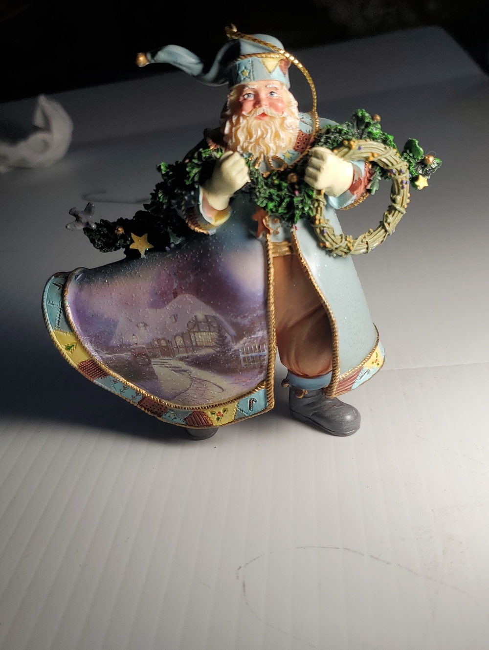 Thomas Kinkade Santa Figurine in Light Blue and Green